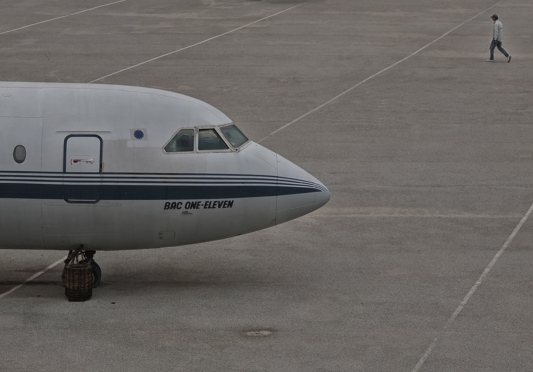 A small airplane sitting on the tarmac